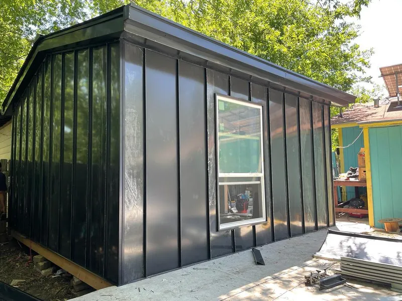 Black standing seam metal wall panels for Metal Roof Installation in Macedon